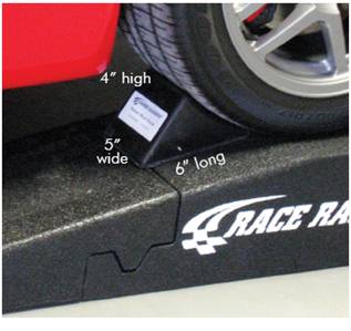 Red corvette with wheel chock and two 2 piece ramp race 